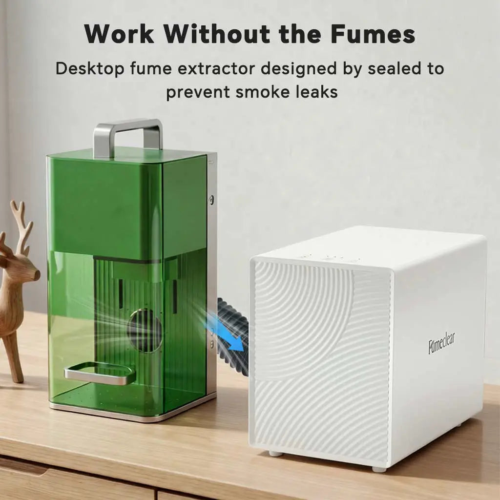 Fumeclear FC-2001X desktop laser fume extractor with sealed design to prevent smoke leaks, shown with green transparent unit and white main body