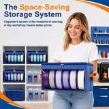 Woman carrying a blue space-saving 3D printer filament storage bag filled with six color spools in a clean workshop room.

